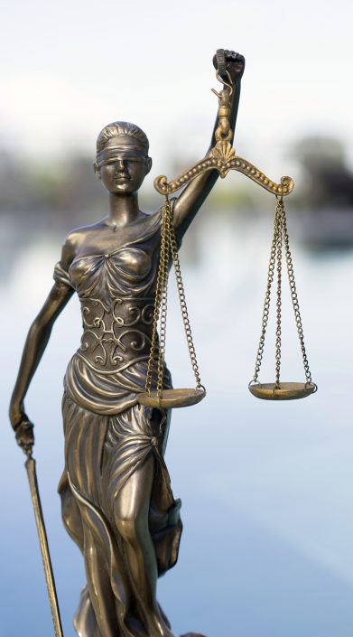 Scales of Justice – legal law concept image. Intentional grunge