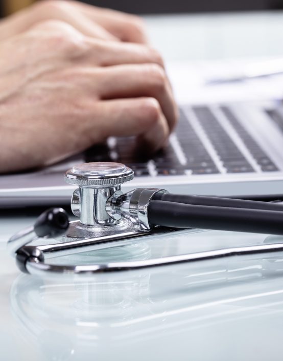 Doctor Using Laptop